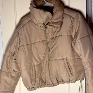 Brand new, nude puffer jacket. Size Med (6)